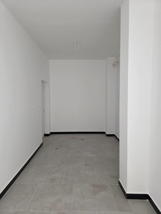 Clădire modernă de închiriat – 850 mp utili, 3 nivele + subsol – Piața Cetate