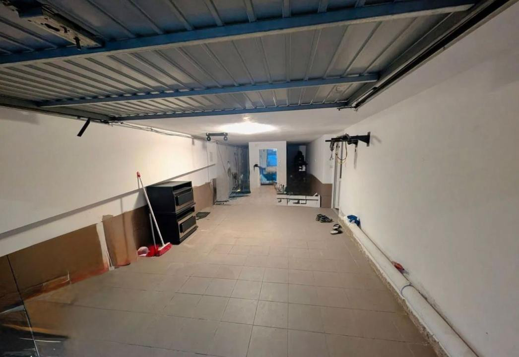 Casă tip înșiruit, D+P+M, 4 camere, garaj, 214 mp teren, zona Centru